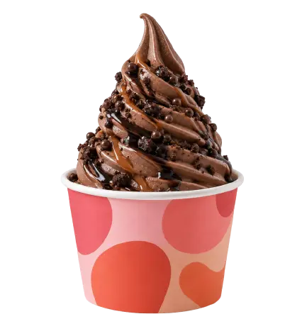Gelato soft serve al cioccolato con salsa al cioccolato e topping