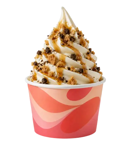 Gelato soft serve alla vaniglia con salsa al caramello e briciole di biscotto